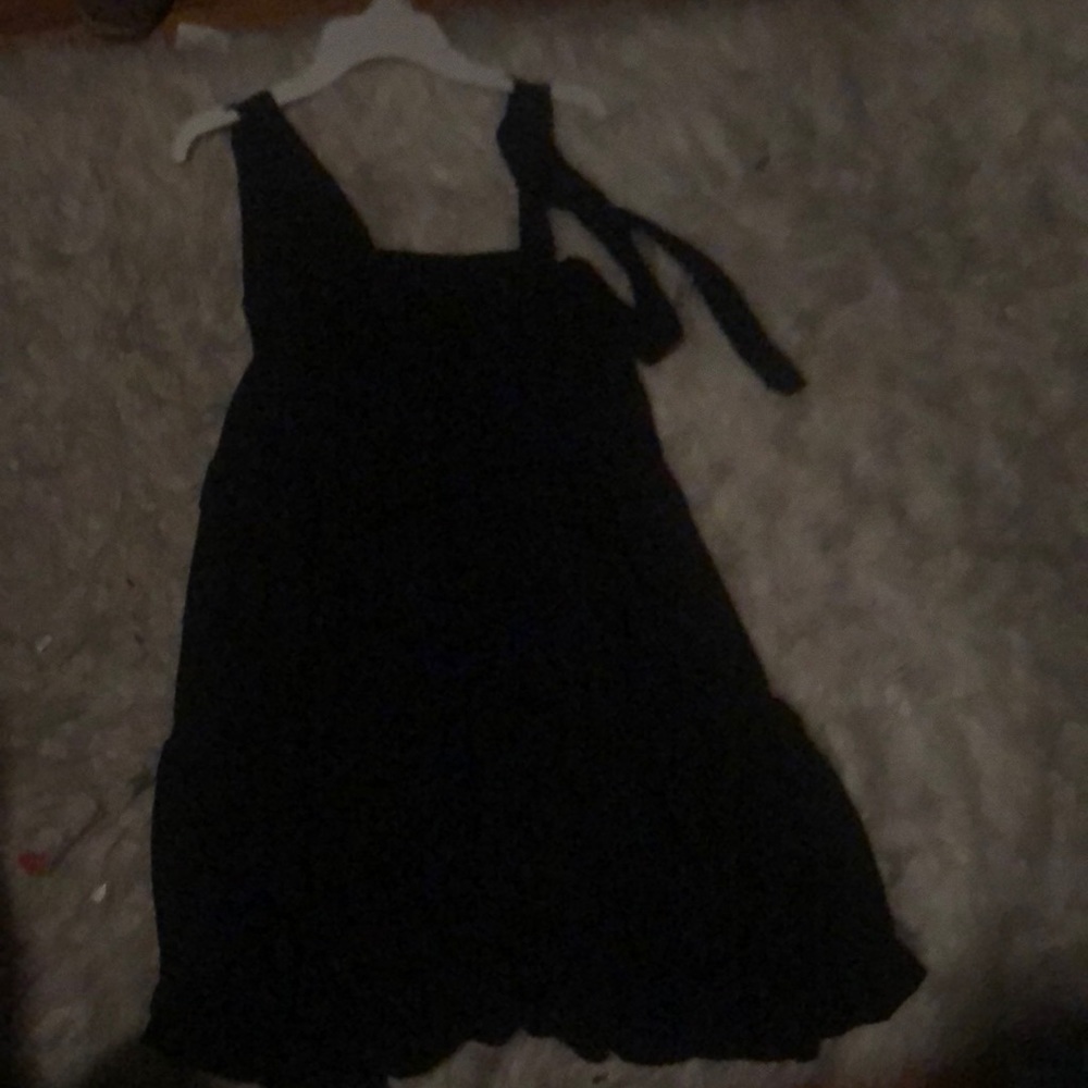 I’m selling a long flowy black dress